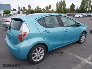 2013 Toyota Prius c One with VIN JTDKDTB33D1055466, listed as a IAAI auction lot 39803165 with 173,123 mi miles. Bid and sale history available at carsss.com. Image 4.