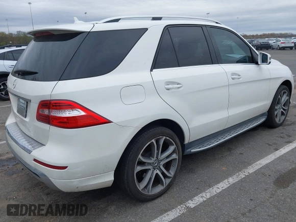 2014 Mercedes-Benz M 350 with VIN 4JGDA5JB2EA282733, listed as a IAAI auction lot 42070426 with 148,513 mi miles and . Bid and sale history available at DreamBid. Image 4.