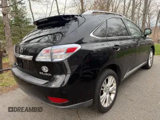 2010 Lexus RX 450h with VIN JTJBC1BA2A2412709, listed as a Copart auction lot 54962565 with 240,611 mi miles and Clean Title. Bid and sale history available at DreamBid. Image 4.