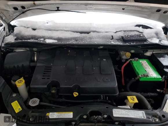 2010 Dodge Grand Caravan Crew with VIN 2D4RN6DX9AR390514, listed as a Copart auction lot 50906305 with 102,729 mi miles and Clean Title. Bid and sale history available at DreamBid. Image 12.