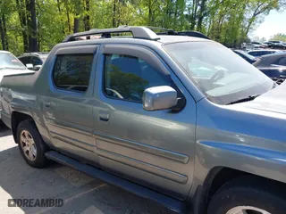 2009 Honda Ridgeline RTS with VIN 5FPYK16409B105186, listed as a IAAI auction lot 42003632 with 153,072 mi miles. Bid and sale history available at carsss.com. Image 12.