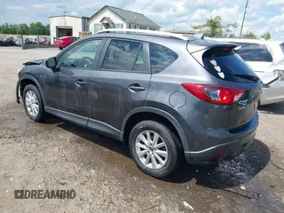2015 Mazda CX-5 Touring with VIN JM3KE4CY9F0506879, listed as a IAAI auction lot 42209768 with 87,690 mi miles and . Bid and sale history available at DreamBid. Image 3.