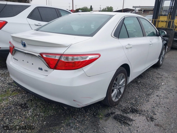2015 Toyota Camry Hybrid LE with VIN 4T1BD1FK9FU148950, listed as a IAAI auction lot 41360155 with 106,069 mi miles. Bid and sale history available at carsss.com. Image 4.