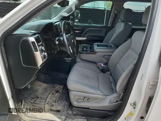 2018 Chevrolet Silverado 1500 LT with VIN 3GCUKREC0JG338434, listed as a IAAI auction lot 42210682 with 177,215 mi miles. Bid and sale history available at carsss.com. Image 1.