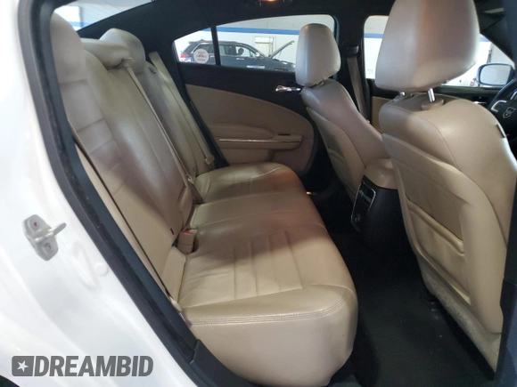 2012 Dodge Charger SE with VIN 2C3CDXBG1CH146027, listed as a Copart auction lot 55129565 with 219,879 mi miles and Salvage Title. Bid and sale history available at DreamBid. Image 10.