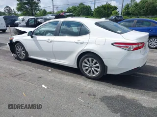 2019 Toyota Camry LE z VIN 4T1B11HKXKU237605, wystawiony jako IAAI lot #42248386 z przebiegiem 70 235 mil mil oraz . Historia ofert i sprzedaży dostępna na DreamBid. Obrazek 3.