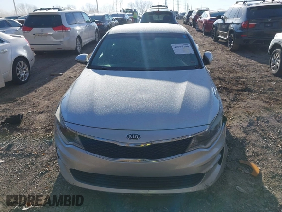 2016 Kia Optima LX with VIN 5XXGT4L35GG059931, listed as a IAAI auction lot 40995180 with 130,596 mi miles. Bid and sale history available at carsss.com. Image 16.
