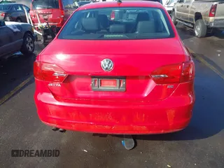 2014 Volkswagen Jetta Sedan SE w/Connectivity with VIN 3VWD07AJ7EM288652, listed as a IAAI auction lot 41630616 with 130,860 mi miles. Bid and sale history available at carsss.com. Image 16.