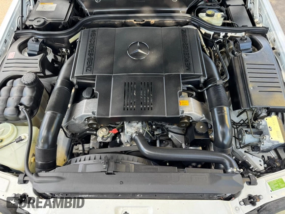 1998 Mercedes-Benz SL 500 z VIN WDBFA67F7WF158652, wystawiony jako Copart lot #65480405 z przebiegiem 91 401 mil mil oraz Czysty tytuł • Clean title. Historia ofert i sprzedaży dostępna na DreamBid. Obrazek 7.