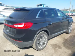 2016 Lincoln MKX Reserve with VIN 2LMTJ8LRXGBL79973, listed as a IAAI auction lot 41772136 with 105,566 mi miles. Bid and sale history available at carsss.com. Image 4.