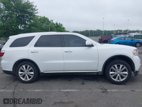 2013 Dodge Durango Crew with VIN 1C4RDJDG4DC518156, listed as a IAAI auction lot 42516880 with 162,402 mi miles and . Bid and sale history available at DreamBid. Image 13.