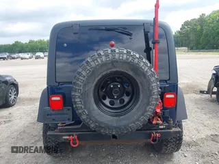 2004 Jeep Wrangler X с VIN 1J4FA39SX4P790573, выставлен на аукционе IAAI как лот 42307292 с пробегом 113 910 миль миль и . История ставок и продаж доступна на DreamBid. Изображение 16.