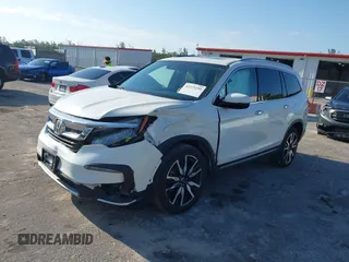 2019 Honda Pilot Touring 8-Passenger z VIN 5FNYF6H98KB016992, wystawiony jako IAAI lot #42275295 z przebiegiem 82 154 mil mil oraz . Historia ofert i sprzedaży dostępna na DreamBid. Obrazek 2.