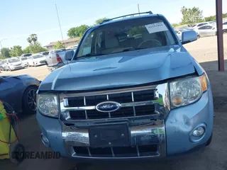 2009 Ford Escape Hybrid z VIN 1FMCU49359KA28475, wystawiony jako IAAI lot #42153444 z przebiegiem 210 067 mil mil oraz . Historia ofert i sprzedaży dostępna na DreamBid. Obrazek 12.
