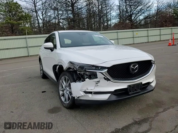 2021 Mazda CX-5 Signature with VIN JM3KFBEY5M0421694, listed as a Copart auction lot 85709714 with 28,126 mi miles and Salvage Title. Bid and sale history available at carsss.com. Image 10.