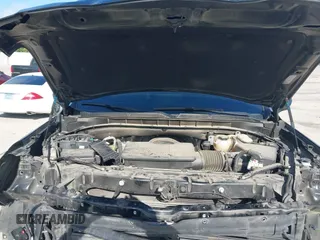 2023 Chevrolet Tahoe LT z VIN 1GNSCNKDXPR477061, wystawiony jako IAAI lot #42225743 z przebiegiem 57 077 mil mil oraz . Historia ofert i sprzedaży dostępna na DreamBid. Obrazek 10.