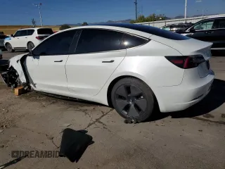 2022 Tesla Model 3 Long Range z VIN 5YJ3E1EB8NF315619, wystawiony jako Copart lot #73309884 z przebiegiem 34 811 mil mil oraz Szkoda całkowita • Salvage title. Historia ofert i sprzedaży dostępna na DreamBid. Obrazek 2.