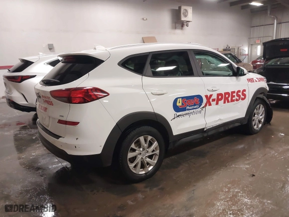 2020 Hyundai Tucson Value with VIN KM8J3CA41LU173419, listed as a IAAI auction lot 40915699 with 90,996 mi miles. Bid and sale history available at carsss.com. Image 4.