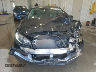 2021 Honda Civic LX z VIN 2HGFC2F60MH502941, wystawiony jako Copart lot #56029145 z przebiegiem 52 290 mil mil oraz Nie do naprawy • Non repairable. Historia ofert i sprzedaży dostępna na DreamBid. Obrazek 5.
