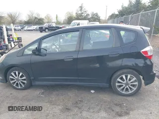 2012 Honda Fit Sport with VIN JHMGE8H52CC022386, listed as a IAAI auction lot 41996636 with 123,070 mi miles. Bid and sale history available at carsss.com. Image 14.