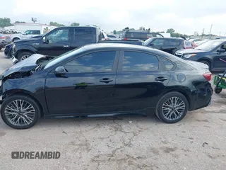 2023 Kia Forte GT-Line z VIN 3KPF54AD8PE542078, wystawiony jako IAAI lot #42113560 z przebiegiem 29 373 mil mil oraz . Historia ofert i sprzedaży dostępna na DreamBid. Obrazek 14.