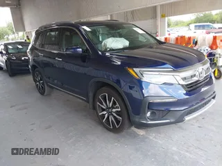 2021 Honda Pilot Touring 8-Passenger with VIN 5FNYF5H93MB002463, listed as a IAAI auction lot 42188141 with 45,583 mi miles and . Bid and sale history available at DreamBid. Image 1.