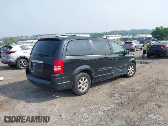 2008 Chrysler Town & Country Touring z VIN 2A8HR54P48R765302, wystawiony jako IAAI lot #42487816 z przebiegiem 128 761 mil mil oraz . Historia ofert i sprzedaży dostępna na DreamBid. Obrazek 4.