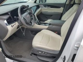 2021 Cadillac XT6 Premium Luxury with VIN 1GYKPCRS8MZ185422, listed as a Copart auction lot 56131775 with 62,043 mi miles and Salvage title. Bid and sale history available at DreamBid. Image 7.
