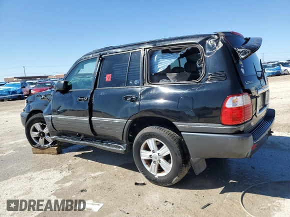 2004 Lexus LX 470 with VIN JTJHT00W043536558, listed as a Copart auction lot 48498305 with Not Provided miles and Salvage Title. Bid and sale history available at DreamBid. Image 2.