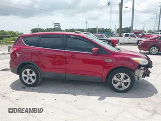 2014 Ford Escape SE with VIN 1FMCU9G92EUA15170, listed as a IAAI auction lot 42456495 with 158,123 mi miles and . Bid and sale history available at DreamBid. Image 14.