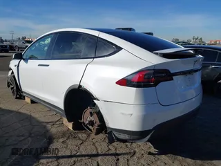 2022 Tesla Model X with VIN 7SAXCBE56NF329657, listed as a IAAI auction lot 41400629 with Not Provided miles and . Bid and sale history available at DreamBid. Image 3.