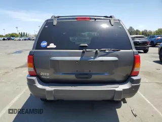 2004 Jeep Grand Cherokee Laredo with VIN 1J4GW48S54C430857, listed as a Copart auction lot 62744305 with 122,099 mi miles and Salvage title. Bid and sale history available at DreamBid. Image 6.