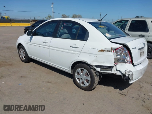 2010 Hyundai Accent GLS with VIN KMHCN4AC7AU473527, listed as a IAAI auction lot 41965592 with 104,506 mi miles. Bid and sale history available at carsss.com. Image 3.