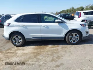 2016 Ford Edge SEL z VIN 2FMPK3J95GBB31467, wystawiony jako IAAI lot #42280106 z przebiegiem Nie podano mil oraz . Historia ofert i sprzedaży dostępna na DreamBid. Obrazek 13.