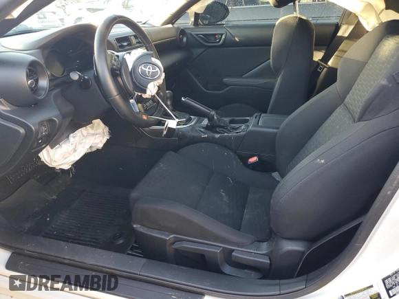 2022 Toyota 86 with VIN JF1ZNBC19N8758457, listed as a Copart auction lot 81175834 with 59,086 mi miles and Salvage Title. Bid and sale history available at DreamBid. Image 7.