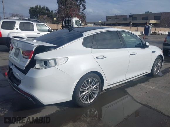 2016 Kia Optima SXL Turbo with VIN 5XXGV4L20GG074869, listed as a IAAI auction lot 41212808 with 82,884 mi miles. Bid and sale history available at carsss.com. Image 4.