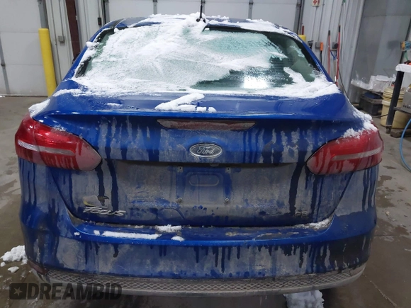 2018 Ford Focus SE z VIN 1FADP3F26JL312725, wystawiony jako IAAI lot #41488559 z przebiegiem 30 686 mil mil oraz . Historia ofert i sprzedaży dostępna na DreamBid. Obrazek 16.