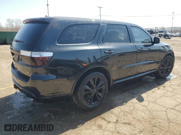 2012 Dodge Durango R/T with VIN 1C4SDHCT7CC321652, listed as a Copart auction lot 51764035 with 173,287 mi miles and Salvage title. Bid and sale history available at DreamBid. Image 3.