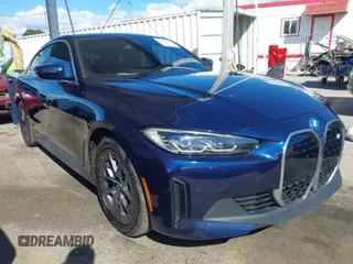 2023 BMW i4 eDrive35 z VIN WBY43AW06PFR09498, wystawiony jako IAAI lot #41745506 z przebiegiem 22 778 mil mil oraz . Historia ofert i sprzedaży dostępna na DreamBid. Obrazek 1.