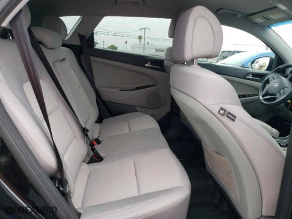 2018 Hyundai Tucson SE with VIN KM8J23A45JU698516, listed as a Copart auction lot 49079215 with 57,609 mi miles and Salvage Title. Bid and sale history available at carsss.com. Image 11.