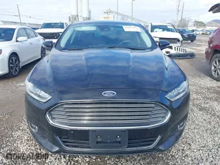 2014 Ford Fusion Energi Titanium with VIN 3FA6P0SU5ER269923, listed as a IAAI auction lot 41086950 with 135,351 mi miles. Bid and sale history available at carsss.com. Image 6.