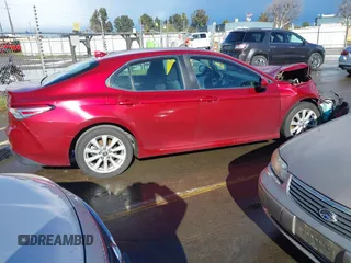 2020 Toyota Camry LE with VIN 4T1C11AK4LU916494, listed as a IAAI auction lot 41786429 with 100,032 mi miles and . Bid and sale history available at DreamBid. Image 13.