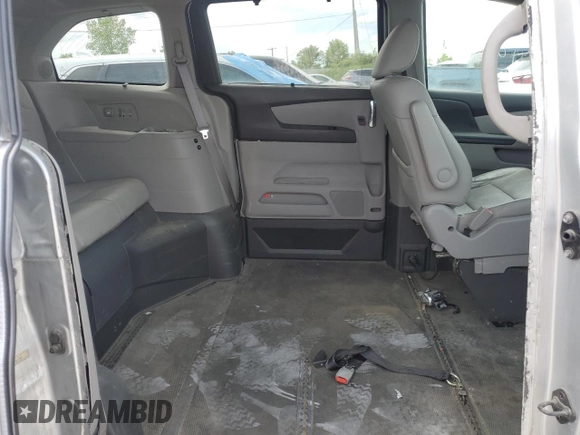 2015 Honda Odyssey Touring Elite z VIN 5FNRL5H93FB041067, wystawiony jako Copart lot #58329355 z przebiegiem 72 000 mil mil oraz Szkoda całkowita • Salvage title. Historia ofert i sprzedaży dostępna na DreamBid. Obrazek 11.