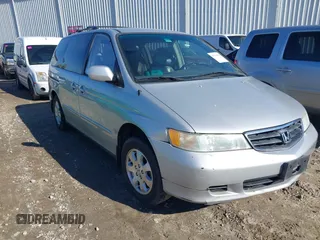 2004 Honda Odyssey EX-L with VIN 5FNRL18974B057715, listed as a IAAI auction lot 41762518 with 193,626 mi miles and . Bid and sale history available at DreamBid. Image 6.