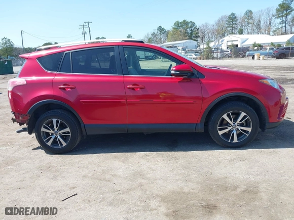 2016 Toyota RAV4 XLE with VIN JTMWFREV6GJ099056, listed as a IAAI auction lot 41941541 with 137,154 mi miles. Bid and sale history available at carsss.com. Image 13.