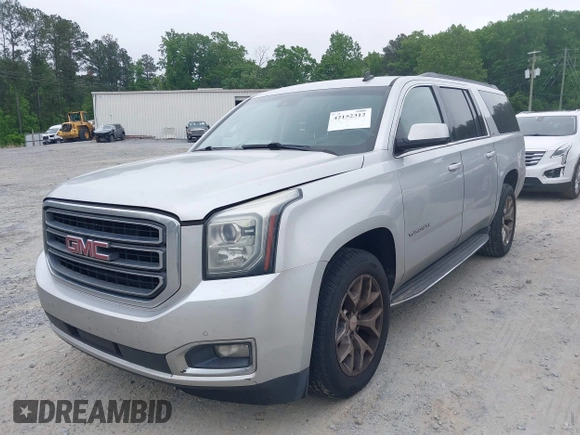 2015 GMC Yukon XL SLT with VIN 1GKS1HKC2FR251672, listed as a IAAI auction lot 42152312 with 232,736 mi miles and . Bid and sale history available at carsss.com. Image 2.
