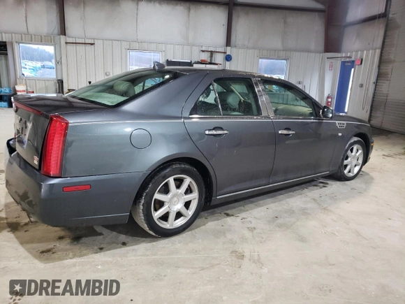 2010 Cadillac STS AWD z VIN 1G6DU6EV5A0113671, wystawiony jako Copart lot #47447395 z przebiegiem 77 062 mil mil oraz Tytuł czysty. Historia ofert i sprzedaży dostępna na DreamBid. Obrazek 3.