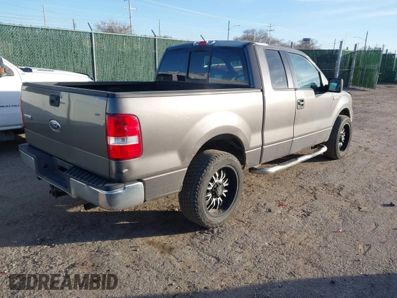2005 Ford F-150 STX with VIN 1FTRX12W15KD34012, listed as a IAAI auction lot 41095300 with 178,984 mi miles. Bid and sale history available at carsss.com. Image 4.