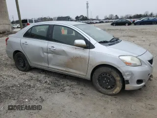 2012 Toyota Yaris with VIN JTDBT4K35CL037319, listed as a Copart auction lot 46098585 with 126,039 mi miles and Salvage Title. Bid and sale history available at DreamBid. Image 4.