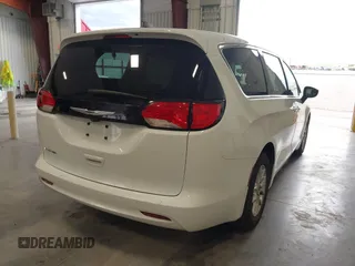 2023 Chrysler Voyager LX z VIN 2C4RC1CG9PR533946, wystawiony jako IAAI lot #42405677 z przebiegiem 64 511 mil mil oraz . Historia ofert i sprzedaży dostępna na DreamBid. Obrazek 4.